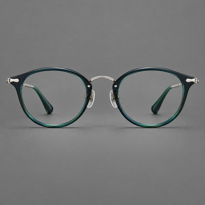 Vintage panto eyeglasses in acetate and titanium with raised brows and textured metal temples in Peacock Blue / Silver, front view frame detail