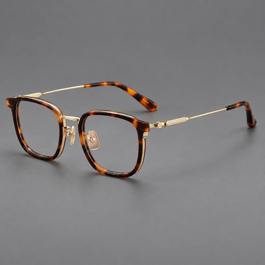 Soft square eyeglasses in acetate and titanium with wide upper corners and fine metal temples in Tortoiseshell / Gold, three quarter view