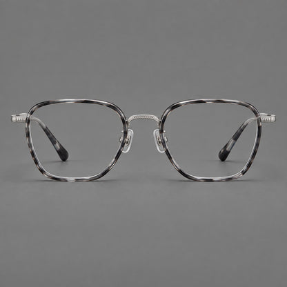 Soft square eyeglasses in acetate and titanium with slim rims and a finely engraved metal bridge in Grey Tortoiseshell / Silver, front view additional product view