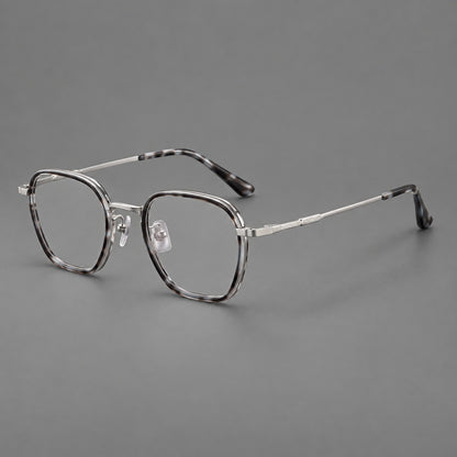 Soft square eyeglasses in acetate and titanium with slim rims and a finely engraved metal bridge in Grey Tortoiseshell / Silver, three quarter view additional product view