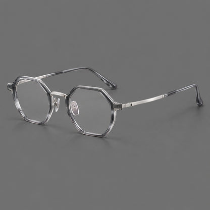 Geometric eyeglasses in acetate and titanium with octagonal rims and a textured metal bridge in Clear Mist Grey / Silver, three quarter view front view