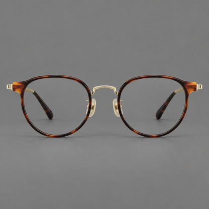 Round eyeglasses in acetate and titanium with widened outer corners and slender metal temples in Tortoiseshell / Gold, front view side view
