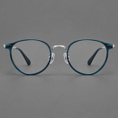 Round eyeglasses in acetate and titanium with widened outer corners and slender metal temples in Peacock Blue / Silver, front view additional product view