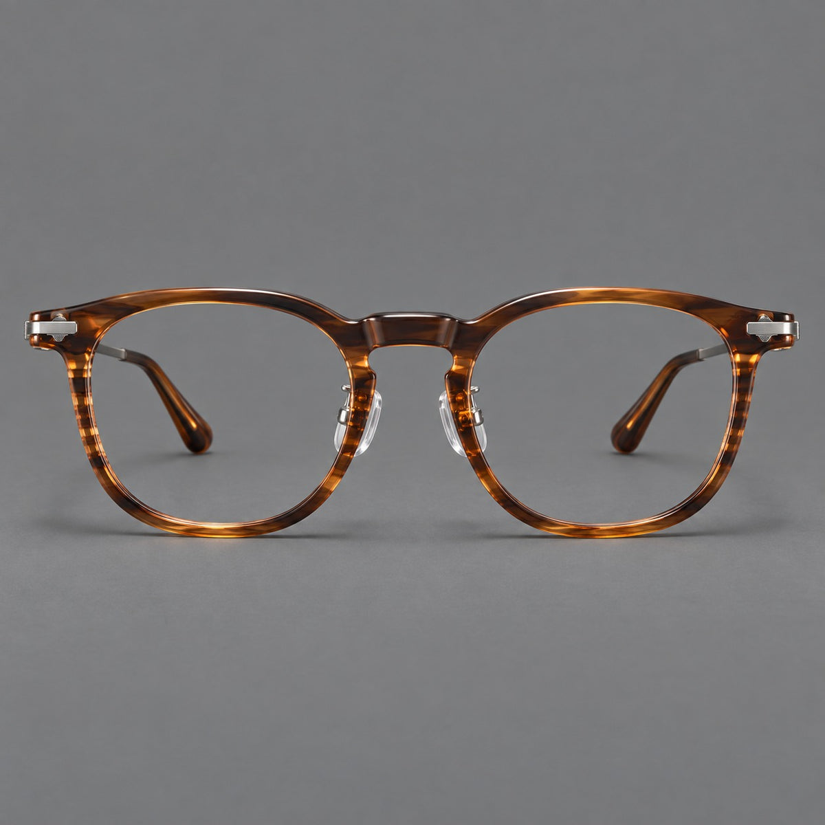 Retro acetate and titanium eyeglasses with soft square rims and sculpted metal corners in Brown Woodgrain / Grey, front view