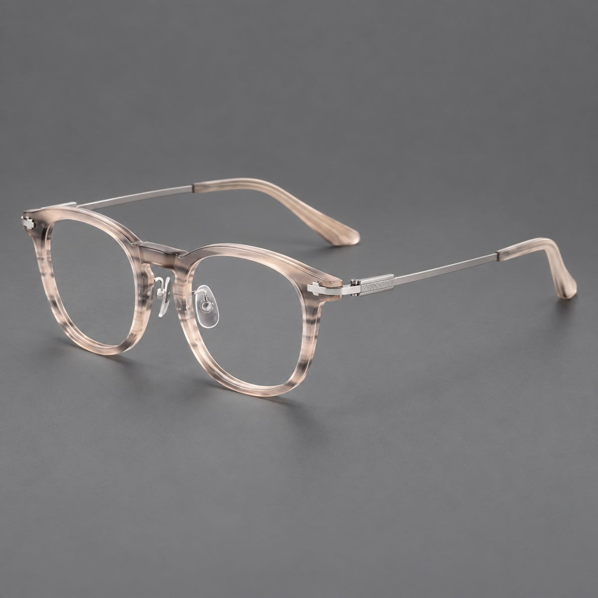 Retro acetate and titanium eyeglasses with soft square rims and sculpted metal corners in Grey Woodgrain / Silver, three quarter view