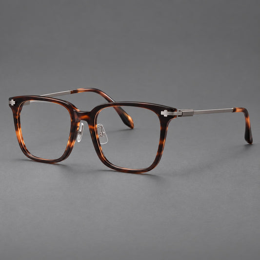 Classic acetate and titanium eyeglasses with broad square rims and textured metal temples in Tortoiseshell / Grey, three quarter view