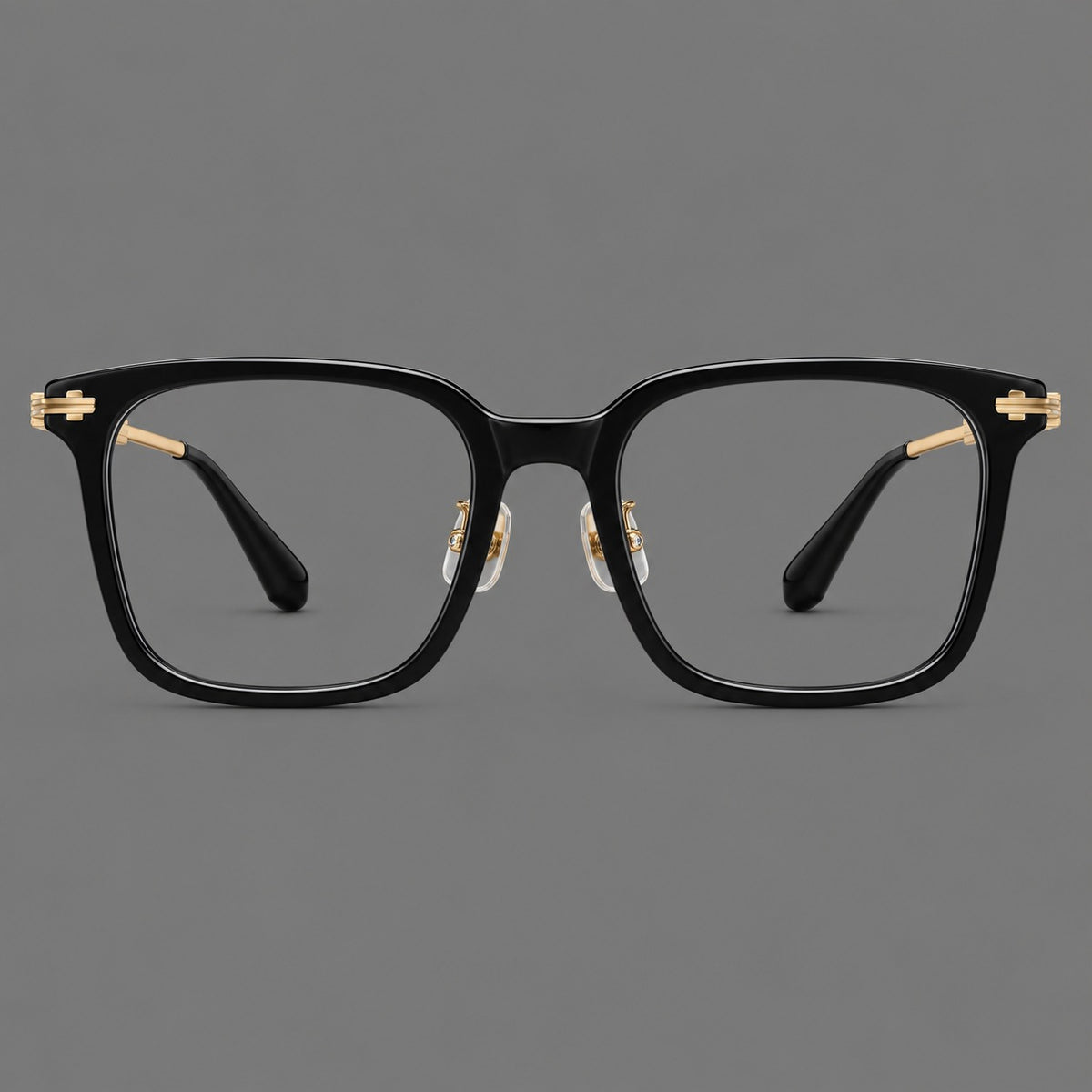 Classic acetate and titanium eyeglasses with broad square rims and textured metal temples in Black / Gold, front view