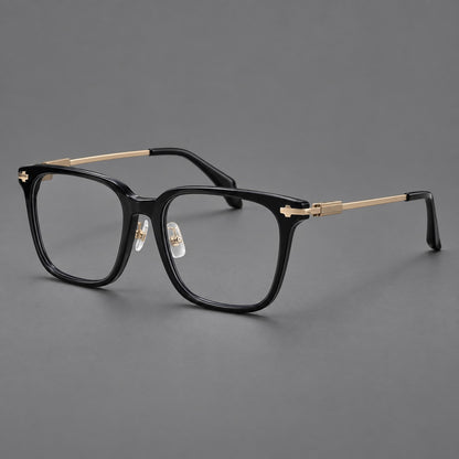 Classic acetate and titanium eyeglasses with broad square rims and textured metal temples in Black / Gold, three quarter view front view