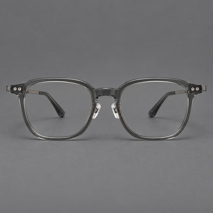 Vintage acetate and titanium eyeglasses with rounded square rims and slotted metal temples in Clear Grey, front view frame detail