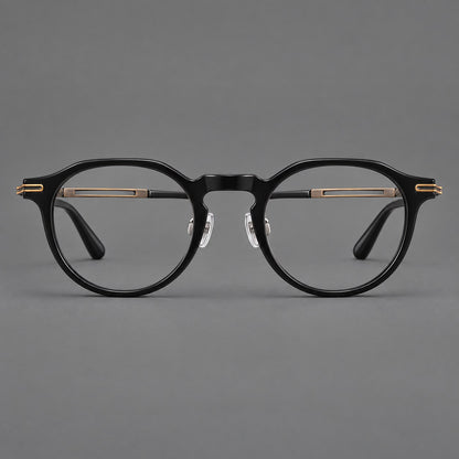 Retro acetate and titanium eyeglasses with round rims and distinctive looped metal joints in Black / Antique Bronze, front view frame detail