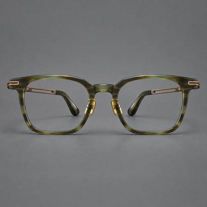 Acetate and titanium eyeglasses with rounded rectangular rims and sculpted open loop joints in Clear Olive Green / Antique Bronze, front view additional product view