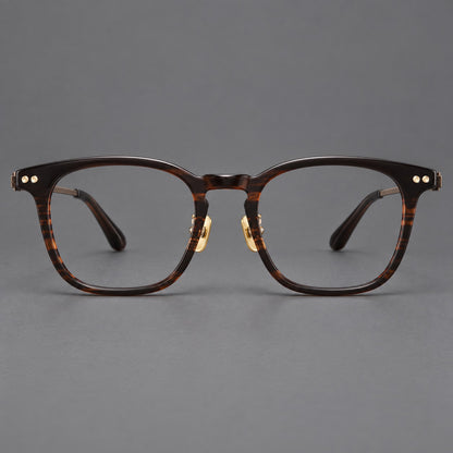 Retro acetate and titanium eyeglasses with gently squared rims and circular metal hinges in Striped Dark Brown / Antique Bronze, front view side view