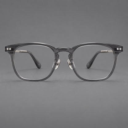 Retro acetate and titanium eyeglasses with gently squared rims and circular metal hinges in Clear Grey / Brushed Grey, front view temple detail