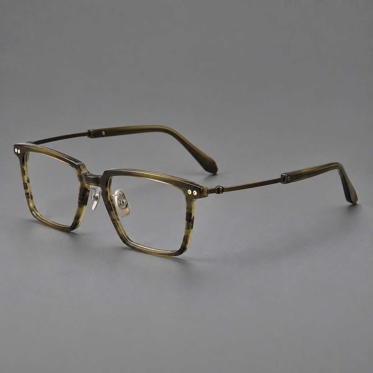 Classic acetate and titanium eyeglasses with a straight brow and rounded rectangular rims in Striped Olive Green / Bronze, three quarter view
