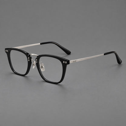 Acetate and titanium eyeglasses with soft square rims and an arched metal bridge in Black / Silver, three quarter view lens detail