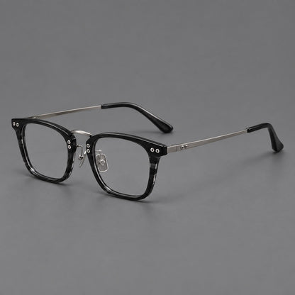 Acetate and titanium eyeglasses with angular rectangular rims and a curved metal bridge in Black / Gunmetal, three quarter view additional product view