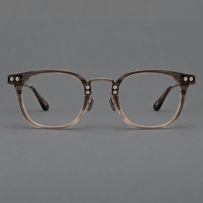 Retro acetate and titanium eyeglasses with softly rounded rims and a metal bridge in Coffee Brown, front view additional product view