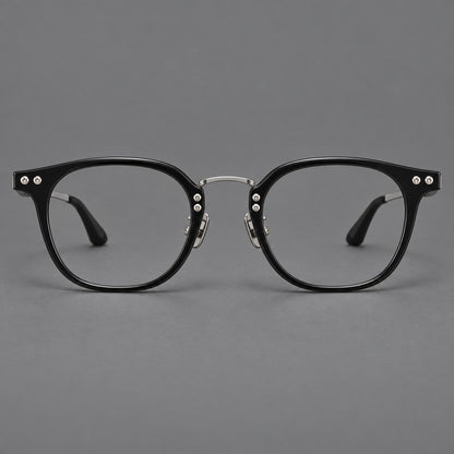 Retro acetate and titanium eyeglasses with softly rounded rims and a metal bridge in Black / Silver, front view additional product view