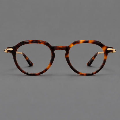 Retro acetate and titanium eyeglasses with panto rims and decorative arrow corner accents in Tortoiseshell / Gold, front view side view
