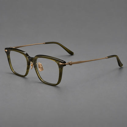 Bold acetate and titanium eyeglasses with rectangular rims and sculpted arrow accents in Army Green / Antique Bronze, three quarter view additional product view