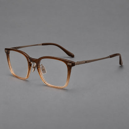 Classic acetate and titanium eyeglasses with rounded square rims and textured corner accents in Brown Gradient / Antique Bronze, three quarter view front view