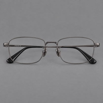 Modern square titanium glasses with an angular bridge and broad straight temples in Gunmetal, front view frame detail