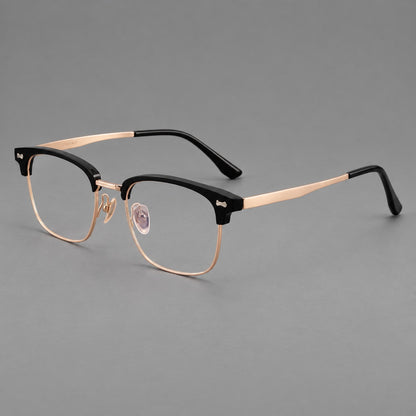 Classic browline titanium glasses with fine lower rims and subtle corner accents in Black and Rose Gold, three quarter view additional product view