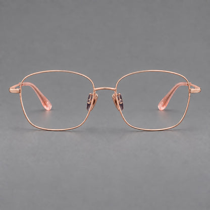 Soft square titanium glasses with angled upper corners and decorated hinges in Rose Gold, front view additional product view