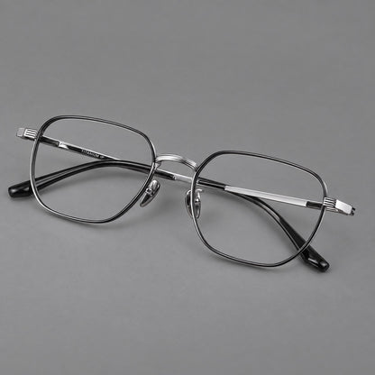 Retro square titanium glasses with rounded rims and finely grooved shoulders in Black and Silver, three quarter view front view
