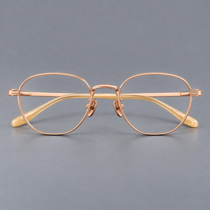 Retro panto titanium glasses with a curved bridge and fine parallel rim grooves in Rose Gold, front view additional product view