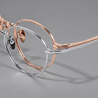 Rounded panto titanium glasses with a raised bridge and dotted temple accents, frame details additional product view