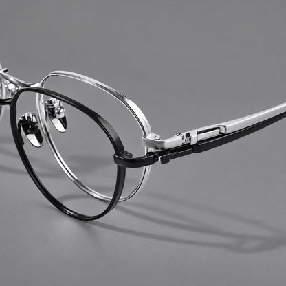 Classic round titanium glasses with broad flat temples and inset hinge details, frame details additional product view