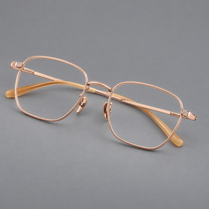 Deep square titanium glasses with a flatter brow and grooved outer shoulders in Rose Gold, three quarter view additional product view