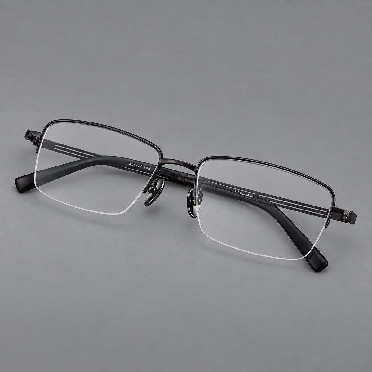 Classic half frame titanium glasses with rectangular lenses and lined temples in Black, three quarter view