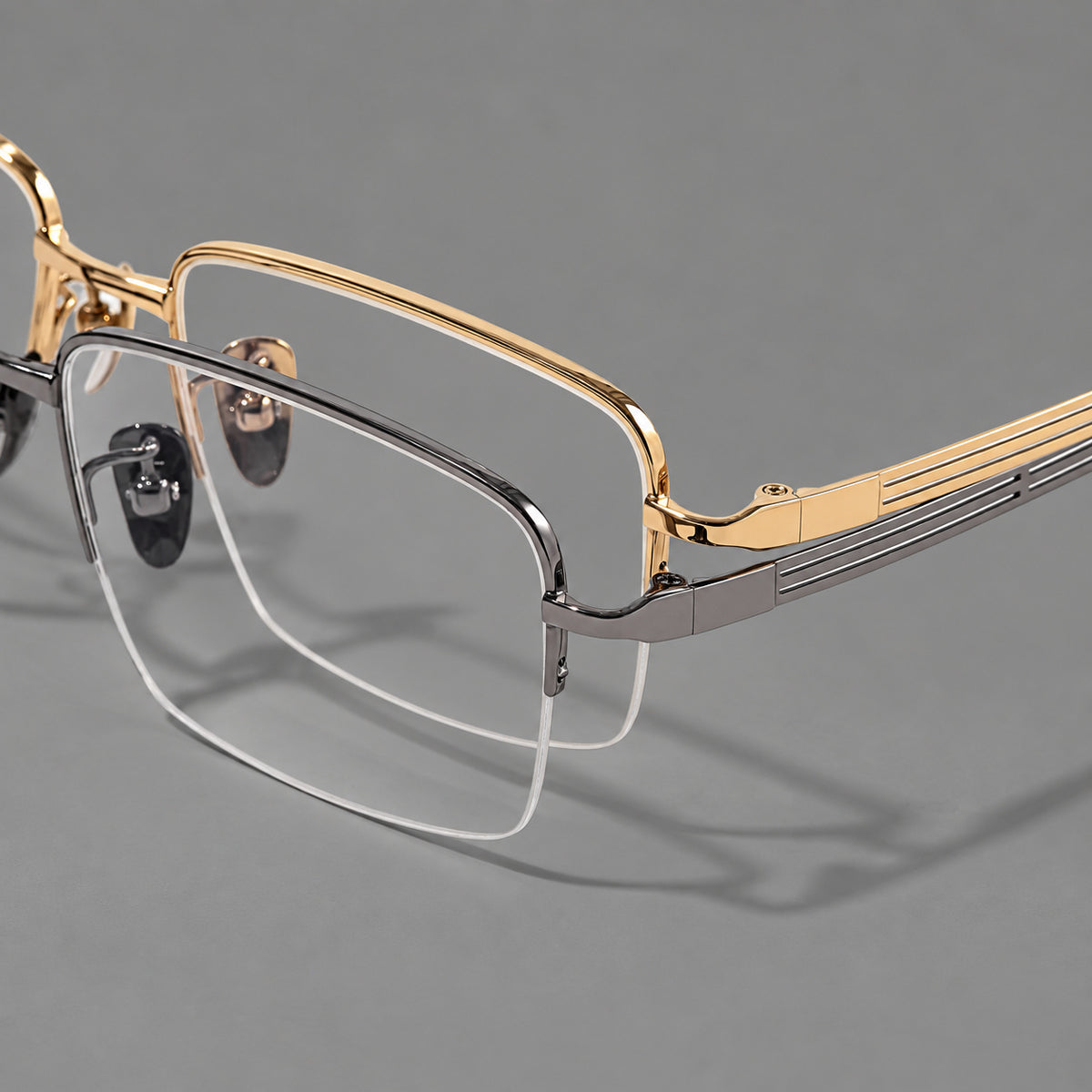 Classic half frame titanium glasses with rectangular lenses and lined temples, frame details