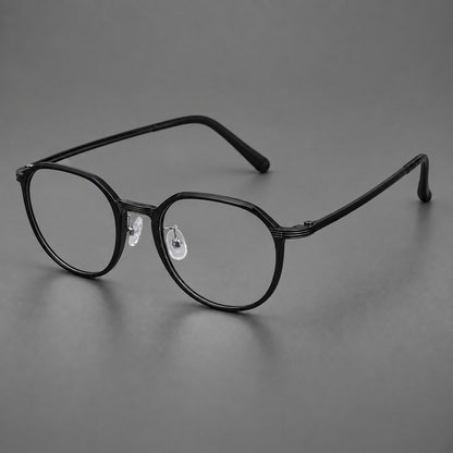 Geometric titanium glasses with flattened corners and a finely ridged bridge in Black, three quarter view