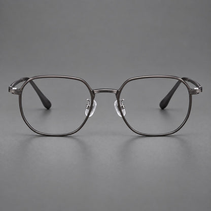 Geometric titanium glasses with flattened corners and a finely ridged bridge in Dark Grey, front view frame detail