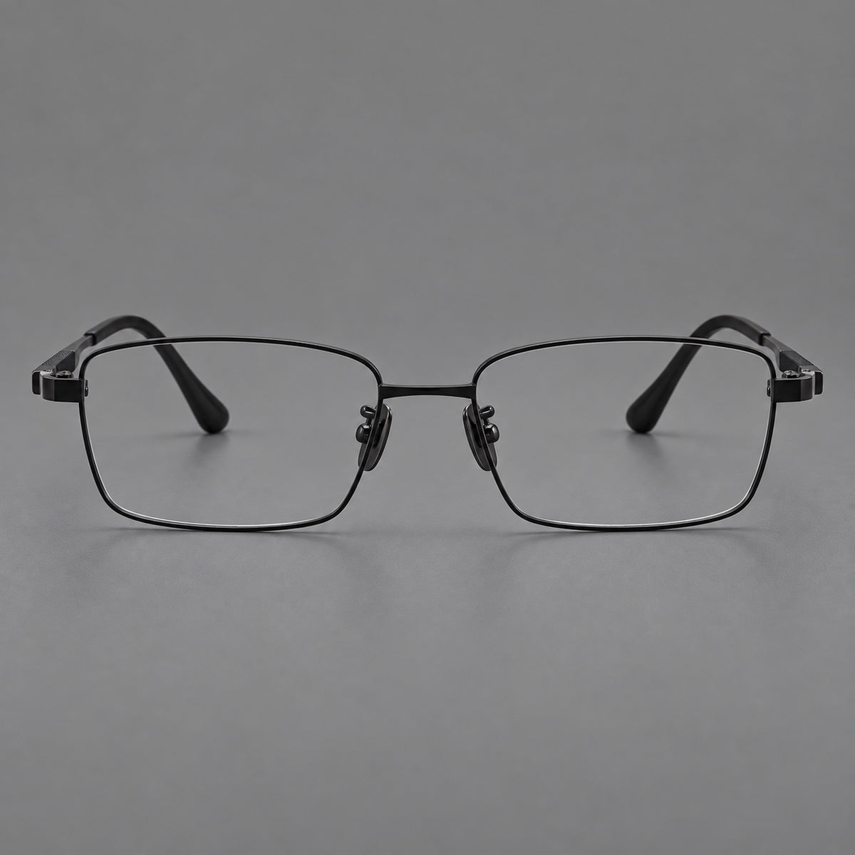 Slim rectangular titanium glasses with broad temples and contrasting dark inserts in Black, front view