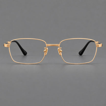 Slim rectangular titanium glasses with broad temples and contrasting dark inserts in Gold, front view temple detail