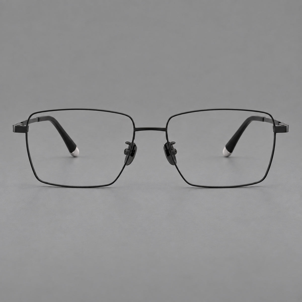 Clean rectangular titanium glasses with inset temple details and pale end accents in Black, front view