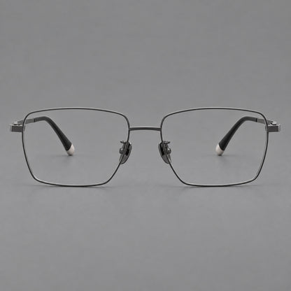 Clean rectangular titanium glasses with inset temple details and pale end accents in Gunmetal, front view frame detail