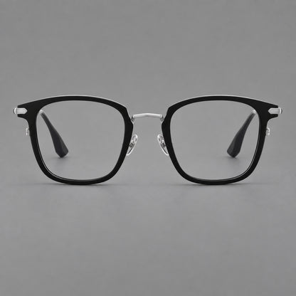 Bold square titanium glasses with a separate bridge and long metal corner accents in Black and Silver, front view temple detail