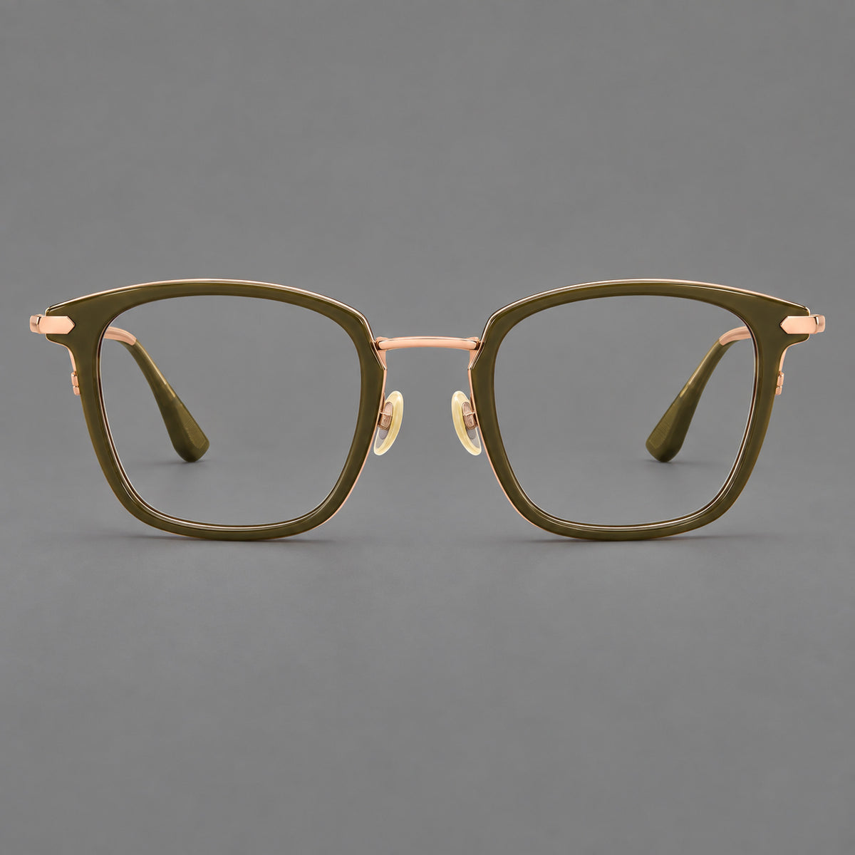 Bold square titanium glasses with a separate bridge and long metal corner accents in Olive Green and Rose Gold, front view