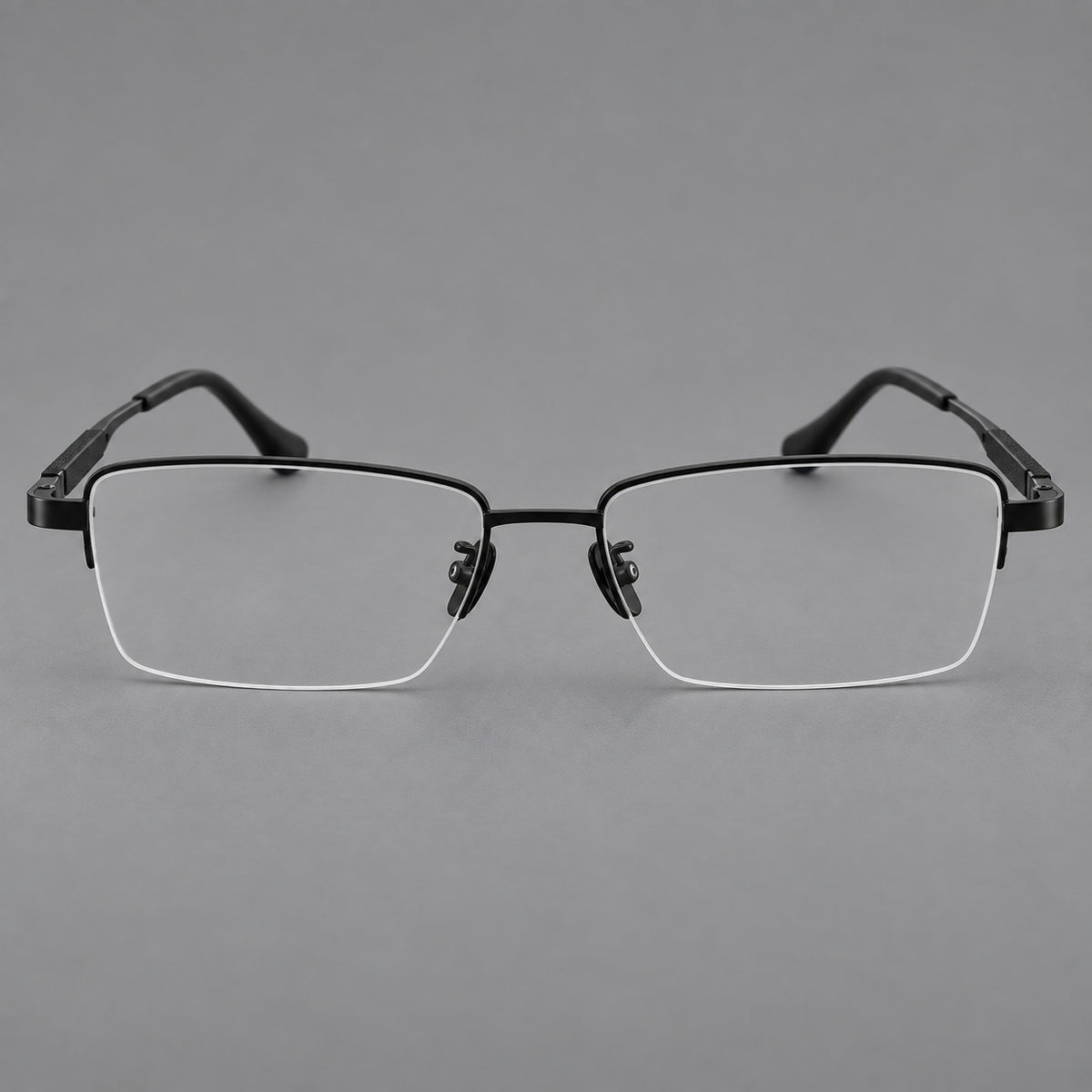 Modern half frame titanium glasses with a narrow bridge and dark temple sections in Black, front view