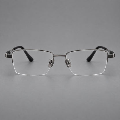 Modern half frame titanium glasses with a narrow bridge and dark temple sections in Grey, front view frame detail