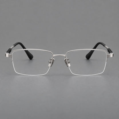 Modern half frame titanium glasses with a narrow bridge and dark temple sections in Silver, front view additional product view