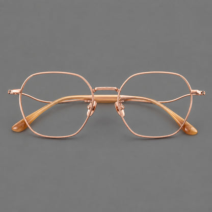 Geometric titanium glasses with engraved rim edges and curved temple joins in Rose Gold, front view additional product view
