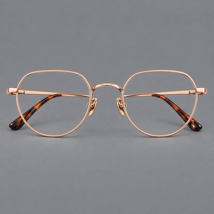 Classic panto titanium glasses with a curved bridge and slim straight temples in Rose Gold, front view additional product view
