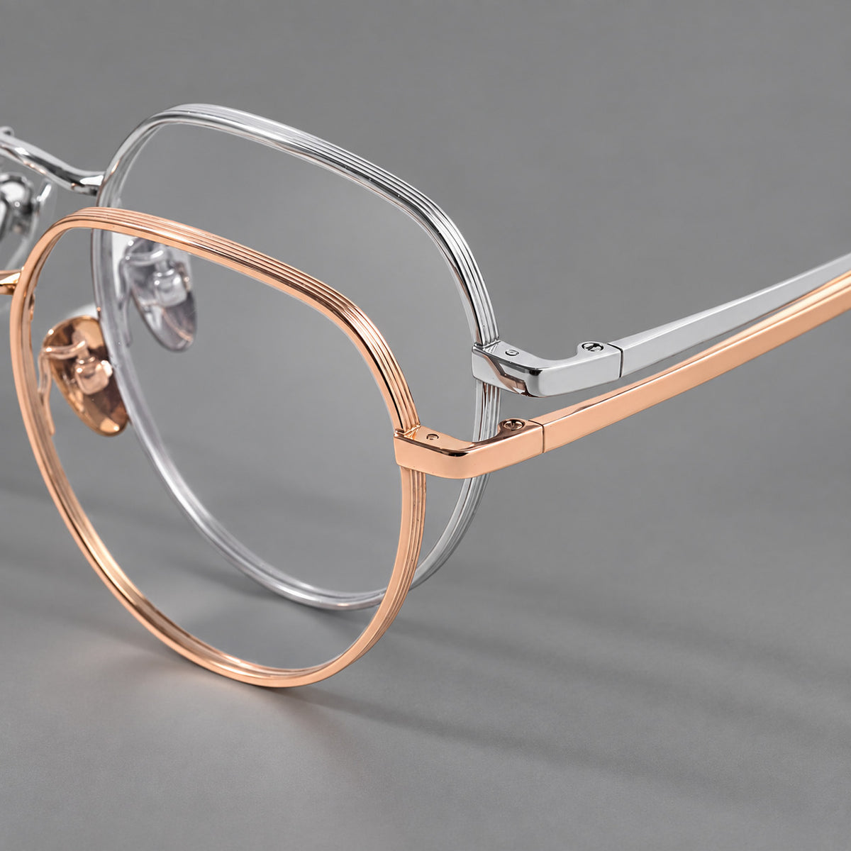 Classic panto titanium glasses with a curved bridge and slim straight temples, frame details