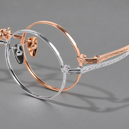 Compact circular titanium glasses with a curved bridge and wavy engraved temples, frame details additional product view